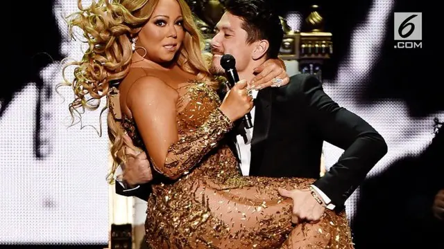 Usai operasi potong lambung, Mariah Carey tampil langsing paripurna.