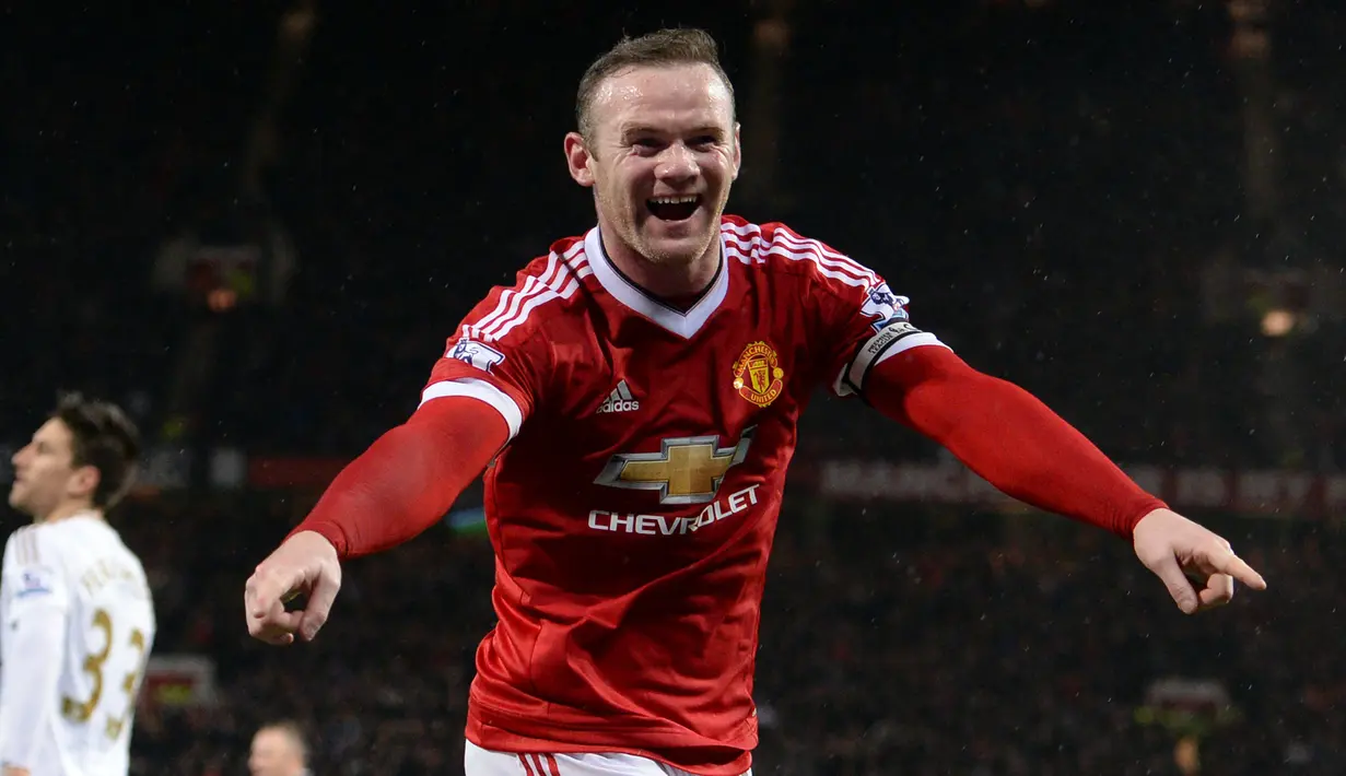 Jumlah gol terbanyak yang dicetak Wayne Ropney dalam satu laga Derbi Manchester adalah dua gol. Momen itu terjadi dua kali, yaitu yang pertama pada putaran ketiga Piala FA musim 2011/2012, 8 Januari 2012 saat MU berhasil menang 3-2 atas Manchester City di City of Manchester Stadium. Sementara yang kedua terjadi pada musim 2012/2013 tepatnya pada pekan ke-16 Liga Inggris, 9 Desember 2011 saat MU juga berhasil menang 3-2 atas Man City di tempat yang sama. (AFP/Oli Scarff)