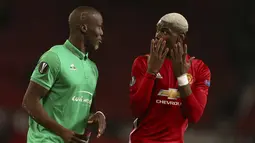 Pogba yang berseragam MU akan menghadapi sang kakak, Florentin yang merupakan bek St. Etienne. Keduanya pun bertekad untuk membawa klubnya masing-masing meraih kemenangan. (AP/Dave Thompson)