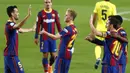 Pemain Barcelona merayakan kemenangan atas Villareal pada laga Liga Spanyol di Stadion Camp Nou, Senin (28/9/2020). Barcelona menang dengan skor 4-0. (AP Photo/Joan Monfort)