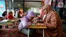 Sejumlah anak mengikuti pesantren kilat di Ruang Publik Terpadu Ramah Anak (RPTRA) Malinjo, Jakarta, Minggu (17/3/2024). (Liputan6.com/Angga Yuniar)