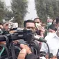 Direktur Rersese Kriminal Khusus Polri Kombes Pol Auliansyah Lubis saat mendatangi TKP di Depok lokasi bansos yang diduga milik Presiden Jokowi