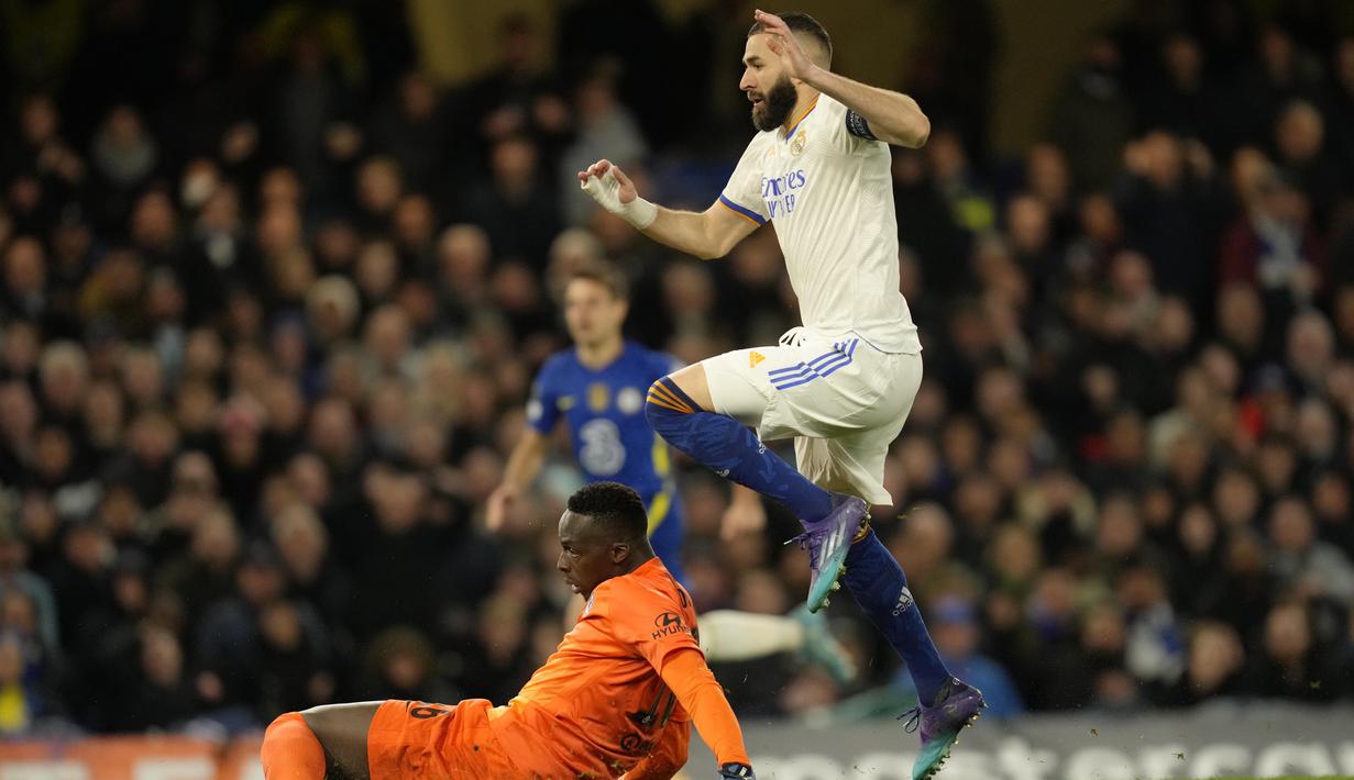 Benzema juga tercatat sebagai pemain Prancis pertama yang mengemas 11 gol di satu musim Liga Champions, mengalahkan capaian Just Fontaine 10 gol di ajang Piala Eropa pada 1958/1959. (AP/Kirsty Wigglesworth)