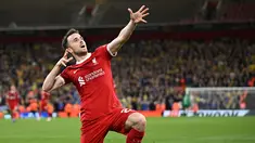 Pemain Liverpool, Diogo Jota melakukan selebrasi setelah mencetak gol kedua timnya ke gawang Union Saint-Gilloise pada laga Grup E Liga Europa 2023/2024 yang berlangsung di Anfield, Inggris, Jumat (6/10/2023) dini hari WIB. Liverpool menang dengan skor 2-0. (AFP/Oli Scarff)