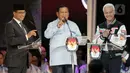 <p>Foto kolase ketiga Calon Presiden pada Pemilu 2024 Anies Baswedan, Prabowo Subianto, dan Ganjar Pranowo (kiri ke kanan) saat Debat Kelima Pilpres 2024 di Jakarta Convention Center (JCC), Jakarta, Minggu (4/2/2024). (Liputan6.com/Angga Yuniar)</p>