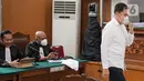 Terdakwa kasus pembunuhan Brigadir Yosua Hutabarat, Arif Rachman usai sidang lanjutan di PN Jakarta Selatan, Jakarta, Selasa (8/11/2022). Putusan dibacakan Hakim Ketua, Ahmad Suhel, di Pengadilan Negeri Jakarta Selatan. (Liputan6.com/Faizal Fanani)
