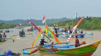 Sedekah laut Desa Ujung Gagak, Kampung Laut, Cilacap. (Foto: Liputan6.com/Muhamad Ridlo)