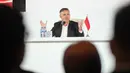 Pria asal Inggris ini dikontrak selama dua tahun disertai opsi perpanjangan. Tampak dalam foto, pelatih kepala tim nasional sepak bola Indonesia yang baru, John Herdman memberi isyarat saat berbicara dalam konferensi pers di Jakarta, Selasa 13 Januari 2026. (AP Photo/Achmad Ibrahim)