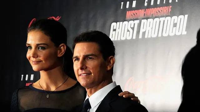 Katie Holmes dan Tom Cruise pada 2011. (Andrew H. Walker / GETTY IMAGES NORTH AMERICA / Getty Images via AFP)