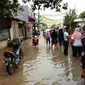 Banjir Villa Nusa Indah akibat hujan deras yang mengguyur sejak Selasa (25/5) sore. (Liputan6.com/Achmad Sudarno)