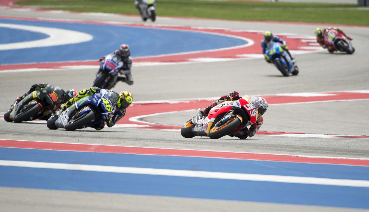 Bagi Marc Marquez, ini adalah kemenangannya yang ketiga secara beruntun di MotoGP Austin, setelah sebelumnya sukses meraih podium juara pada 2013 dan 2014 lalu. (AP Photo/Darren Abate)