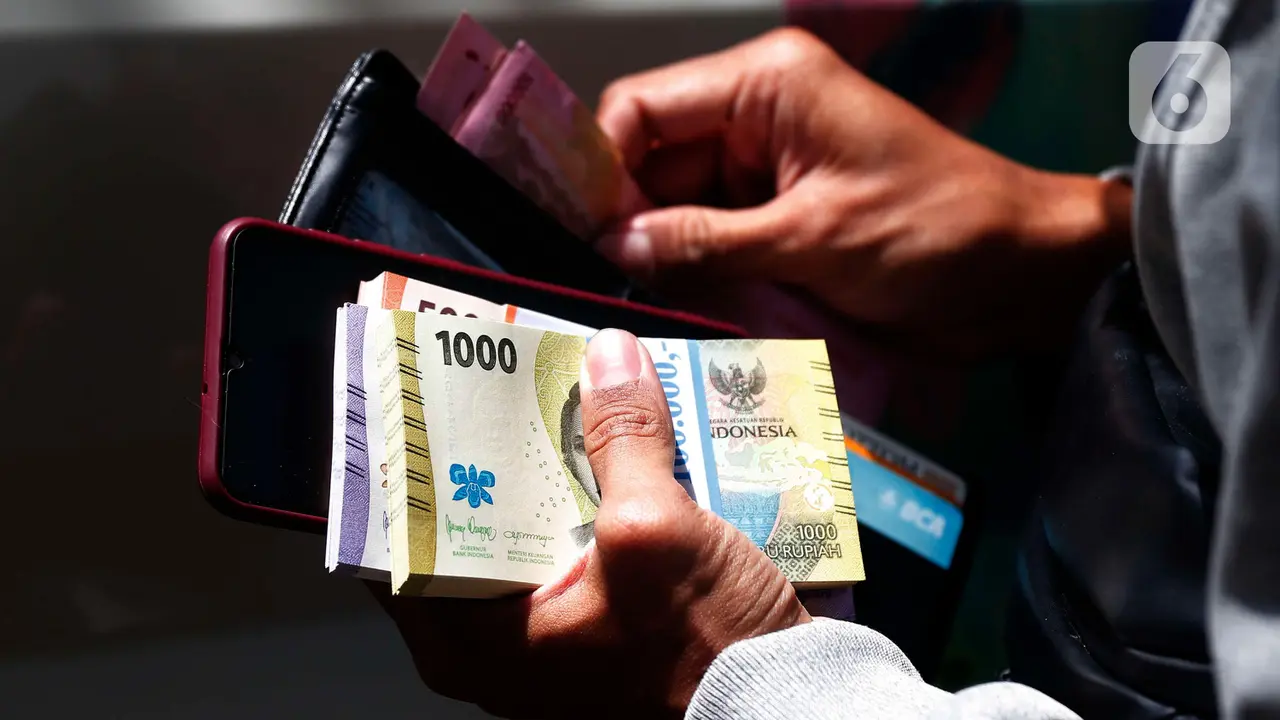 Warga Mulai Berburu Penukaran Uang Baru Lebaran