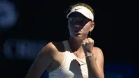 Petenis remaja Ukraina Marta Kostyuk mencatat sejarah dengan menjadi sosok termuda yang mencapai babak tiga Australia Terbuka. Dia mengalahkan Olivia Rogowska di babak dua, Rabu (17/1/2018). (AFP/Peter Parks)