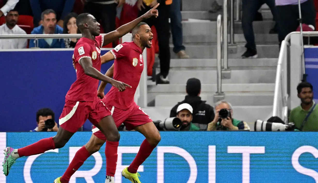 Qatar menang dramatis atas Iran dengan skor 3-2. (HECTOR RETAMAL/AFP)