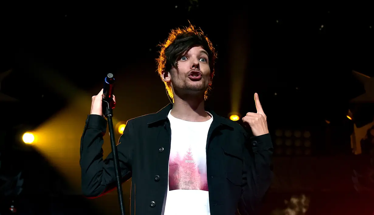 Seperti yang dilansir oleh TMZ, Louis meminta keadilan dengan mengajukan hak asuh anak. (AFP/Kevin Winter) 