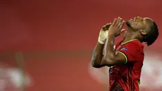 Penyerang timnas Belgia, Michy Batshuayi berselebrasi setelah mencetak gol ke gawang Islandia pada matchday kedua UEFA Nations League A Grup 2 di King Baudouin Stadium, Rabu (9/9/2020) dini hari WIB. Belgia yang sempat tertinggal lebih dulu, menang telak 5-1 atas Islandia. (AP Photo/Francisco Seco)