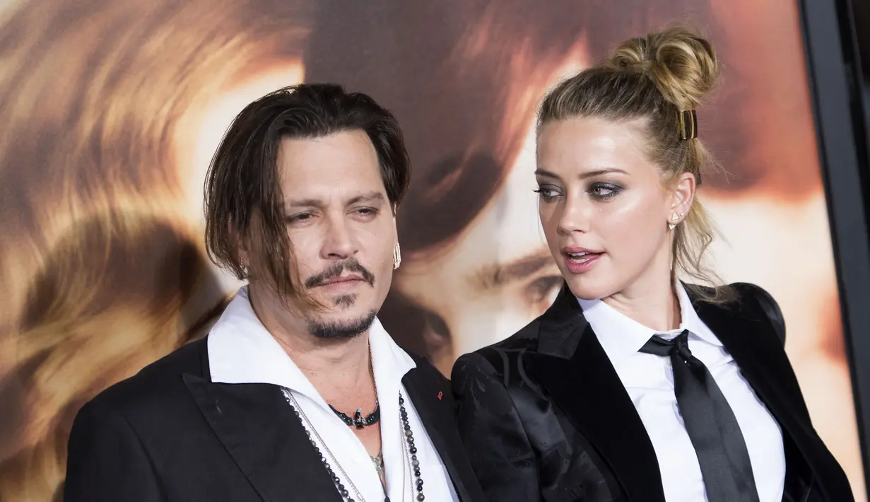 Perceraian Johnny Depp dan Amber Heard memang sudah selesai satu setengah tahun yang lalu. (VALERIE MACON / AFP)
