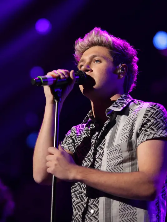 Niall Horan memiliki cara tersendiri demi menghabiskan waktu di sela-sela kesibukannya. Ia gemar berolahraga, menonton film tanpa ditemani seorang wanita. (AFP/Bintang.com) 