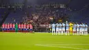 Pemain Lazio dan Atletico Madrid mengheningkan cipta untuk mengenang para korban banjir Libya dan gempa Maroko sebelum pertandingan sepak bola Grup E Liga Champions  di Stadion Olimpiade Roma, Roma, Italia, Selasa (19/9/2023). Banjir Libya menewaskan lebih dari 11.000 orang dan 10.100 lainnya hilang, sementara gempa Maroko menewaskan setidaknya 2.900 orang. (AP Photo/Andrew Medichini)