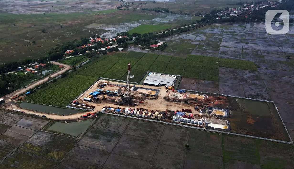 Foto udara sumur eksplorasi East Pondok Aren (EPN)-001 di WK PEP Tambun Field, Desa Sukawijaya, Tambelang, Kabupaten Bekasi, Jawa Barat, Kamis (28/12/2023). (merdeka.com/Imam Buhori)