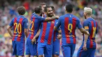 Para pemain Barcelona saat merayakan gol Arda Turan ke gawang Celtic pada laga International Champions Cup, di Dublin, Sabtu (30/7/2016). (AFP/Paul Faith). 