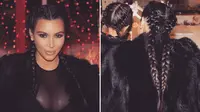 Kim Kardashian dengan rambut kepang. Sumber: Cosmopolitan.