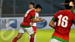 Achamad Jufriyanto mengepalkan tangan usai mencetak gol ke gawang Kyrgyzstan (Liputan6.com/ Helmi Fithriansyah)