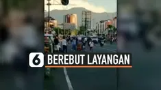 BAHAYAKAN NYAWA, WARGA BEREBUT LAYANGAN HINGGA KE JALAN RAYA