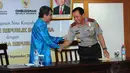 Nota kesepahaman ini juga menyertakan kesepakatan yakni pemberian bantuan teknis dari kepolisian untuk menghadirkan secara paksa terlapor atau saksi yang tidak memenuhi panggilan Ombudsman RI, Jakarta, (9/9/14). (Liputan6.com/Andrian M Tunay)