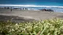 Sebelumnya, gelombang tsunami di wilayah tersebut dipicu oleh gempa bumi dahsyat berkekuatan magnitudo 8,7 yang mengguncang lepas pantai timur Rusia. (Philip FONG/AFP)