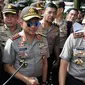 Kapolri Jenderal Tito Karnavian setibanya di lokasi penggerebekan teroris Tangerang Selatan (Tangsel), Banten, Rabu (21/12). Penggerebekan terduga teroris di Tangsel merupakan hasil pengembangan dari kasus bom panci di Bekasi. (Liputan6.com/Helmi Afandi)