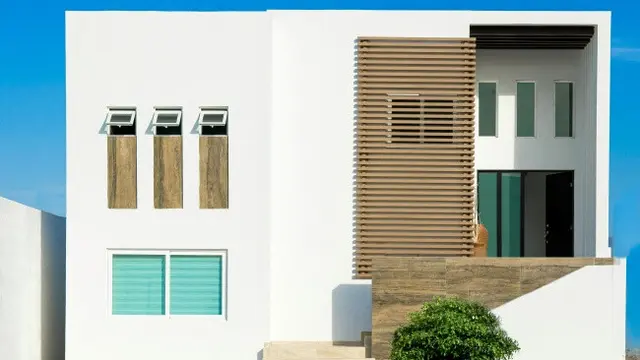 Ilustrasi Model Rumah Minimalis di Perkotaan Padat Penduduk (Credit: Fotografías inmobiliarias/Unsplash)