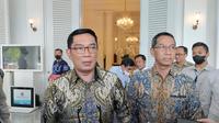 Ridwan Kamil ditemui usai bertemu Penjabat (Pj) Gubernur DKI Jakarta Heru Budi Hartono di Balai Kota DKI Jakarta, Selasa (20/12/2022). (Foto:Liputan6/Winda Nelfira)