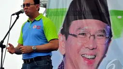 Gubernur DKI Jakarta Basuki T Purnama (Ahok) saat membuka acara peringatan Hari Kesetiakawanan Sosial Nasional (HKSN) di Silang Monas, Sabtu (13/12/2014). (Liputan6.com/Johan Tallo)