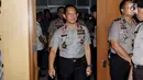 Kapolri Jenderal Pol Tito Karnavian bersiap mengikuti raker dengan Komisi III DPR di Kompleks Parlemen Senayan, Jakarta, Rabu (14/3). Rapat membahas persiapan Polri dalam pengamanan Pilkada Serentak 2018. (Liputan6.com/Johan Tallo)