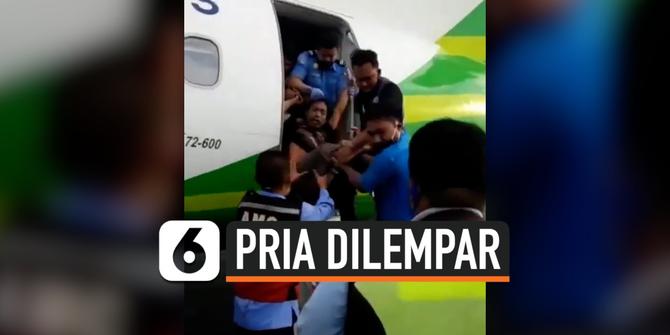 VIDEO: Petugas Bandara Lempar Pria yang Menyelinap Masuk ke Pesawat
