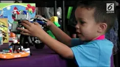 Anak-anak zaman sekarang terbiasa dengan ponsel dan tablet. VOA