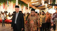 Bakal Calon Presiden (Bacapres) Ganjar Pranowo bersama Mahfud Md di acara ngunduh mantu dari putra ketiga dari Muhammad Musthofa Aqiel Siroj. (dok Tim Media Ganjar Pranowo)