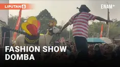 Puluhan domba yang telah dihias berjalan di atas panggung Domba Fashion Carnival di Desa Suco, Mumbulsari, Jember, Jawa Timur, Sabtu (21/9/2024). Acara tersebut bertujuan untuk menggairahkan perekonomian warga dari sektor peternakan di desa sentra do...