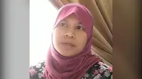 Tuti Nuhayati, Tenaga Kerja Wanita (TKW) asal Purwakarta, Jawa Barat, hanya bisa mengunggah video dan memohon Presiden Jokowi agar dirinya bisa pulang kembali ke tanah air. (Liputan6.com/ Abramena)