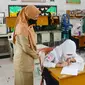 Pembelajaran tatap muka terbatas di Pekanbaru selama pandemi Covid-19. (Liputan6.com/M Syukur)