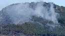 Api di daerah Portbou membakar sekitar 200 hektare dalam tiga jam dan dapat menyebar lebih dari 400 hektare, kata pemerintah daerah Catalonia dalam sebuah pernyataan. (AFP/Raymond Roig)