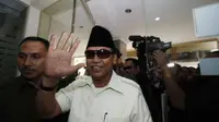 Pemimpin YPI Al Zaytun Indramayu, Panji Gumilang tiba di Gedung Bareskrim Polri, Jakarta, Selasa (19/7). Panji memenuhi panggilan terkait kasus dugaan pemalsuan akta otentik kepengurusan YPI.(Antara)