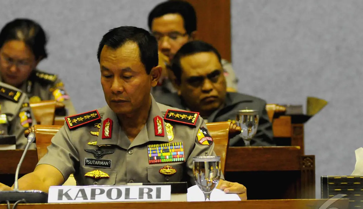 Kapolri Jenderal (Pol) Sutarman tampak serius saat menghadiri rapat dengan Baleg DPR di Kompleks Parlemen, Senayan, Jakarta, Senin (15/9/2014) (Liputan6.com/Andrian M Tunay)