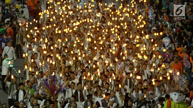 Sambut Tahun Baru Islam, Ribuan Peserta Ikuti Pawai Obor