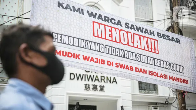 Spanduk peringatan pemudik