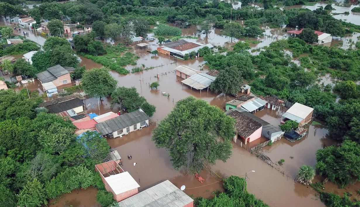 Keadaan darurat banjir Bolivia memungkinkan pemerintah setempat memobilisasi lebih banyak personel untuk operasi penyelamatan, serta mempercepat pembelian peralatan. (RODRIGO URZAGASTI/AFP)