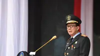 Menteri Hukum dan Hak Asasi Manusia (Menkumham) Yasonna H. Laoly saat memberikan sambutan pada peringatan Hari Pengayoman atau hari lahir Kemenkumham yang ke-79 di Lapangan Upacara Kemenkumham, Jakarta, Senin (19/8/2024).