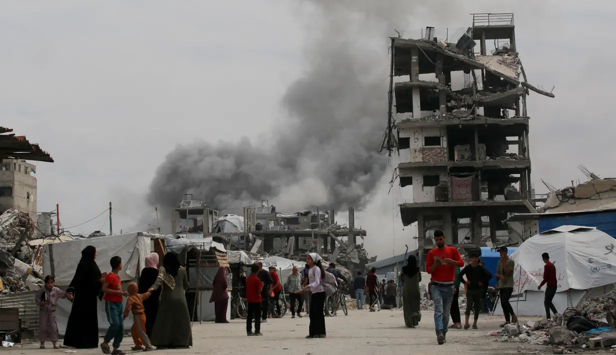 Sejumlah pejabat pertahanan sipil Gaza mengatakan kepada AFP setidaknya 80 orang tewas akibat pengeboman Israel pada 14 Mei, termasuk 59 orang di bagian utara. (Bashar TALEB/AFP)