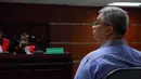 Tubagus Chaeri Wardana alias Wawan didakwa bersama Gubernur Banten Ratu Atut, turut serta menjanjikan atau menyuap mantan Ketua Mahkamah Konstitusi (MK) Akil Mochtar (Liputan6.com/Miftahul Hayat)